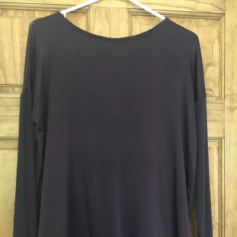 A long sleeve purple blouse